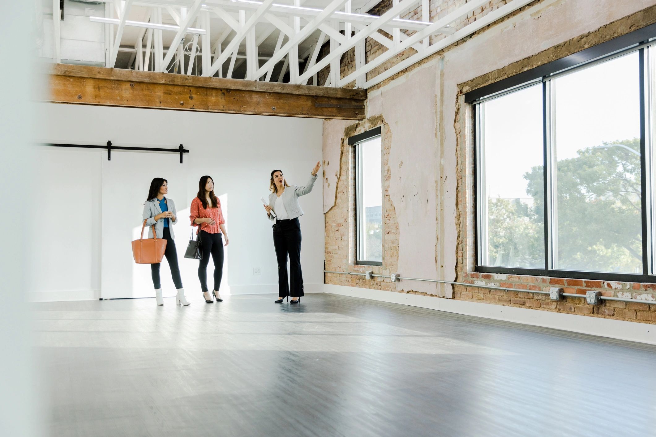 Real estate professionals collaborating in an office setting