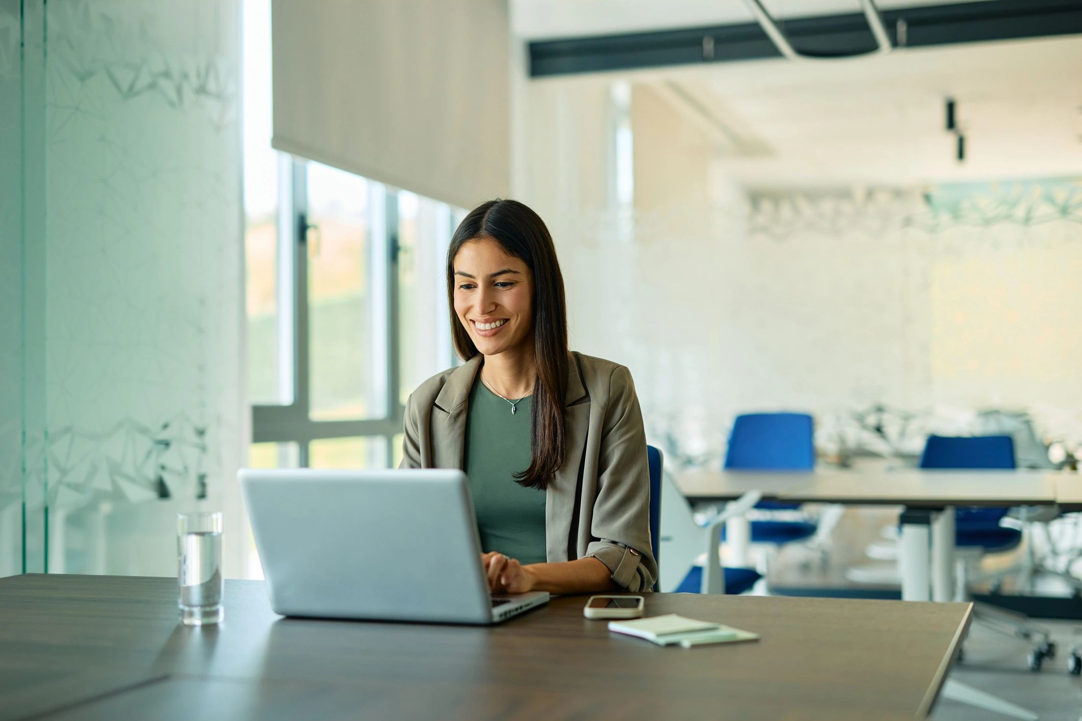 Professional real estate agent working in an office